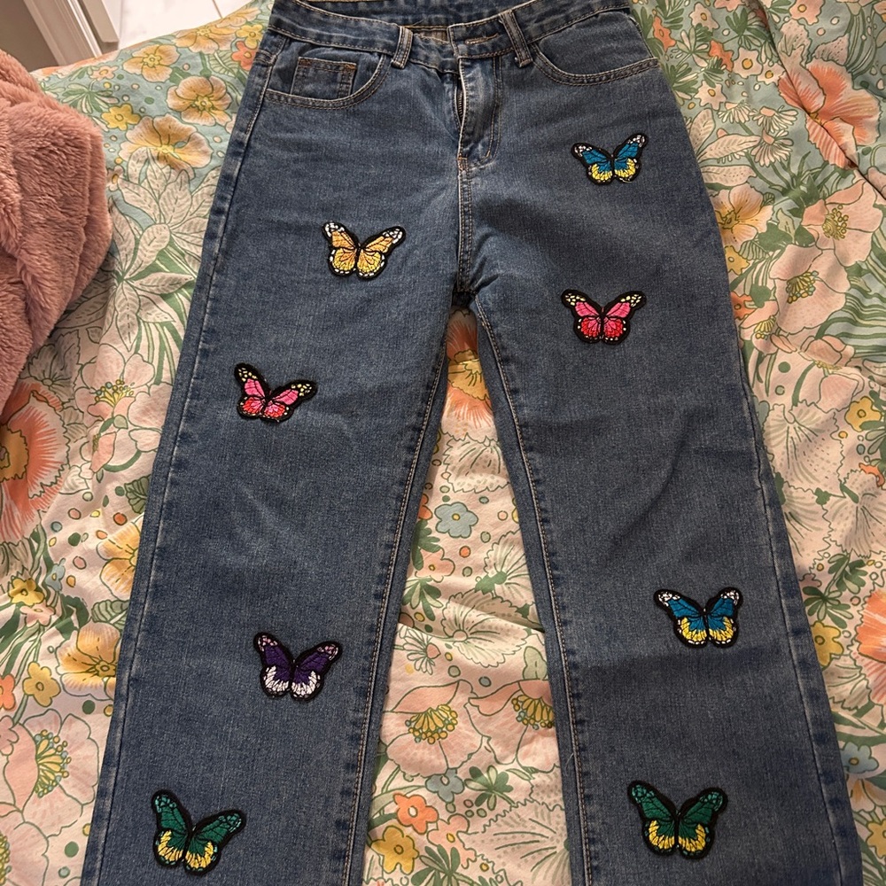 Butterfly patched jean pants size small